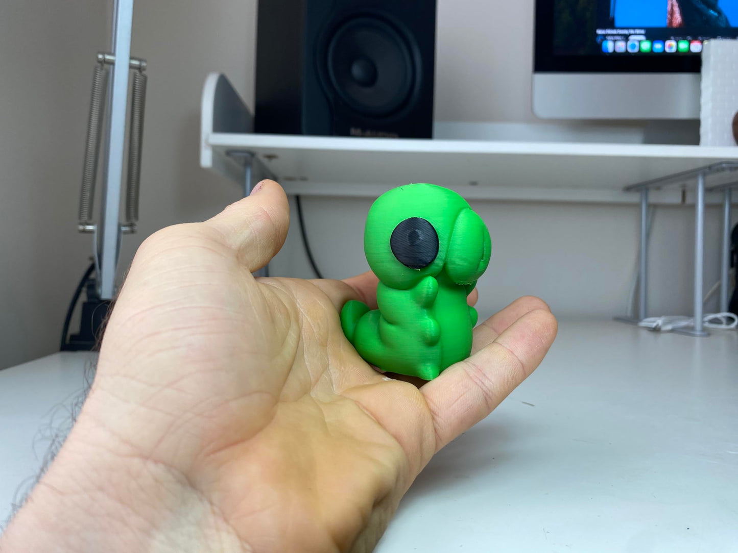 Little Green Grub Figurine - Vibrant Handheld Forest Creature Statue - Indie Game Inspired Desktop Companion and Gaming Room Shelf Decor