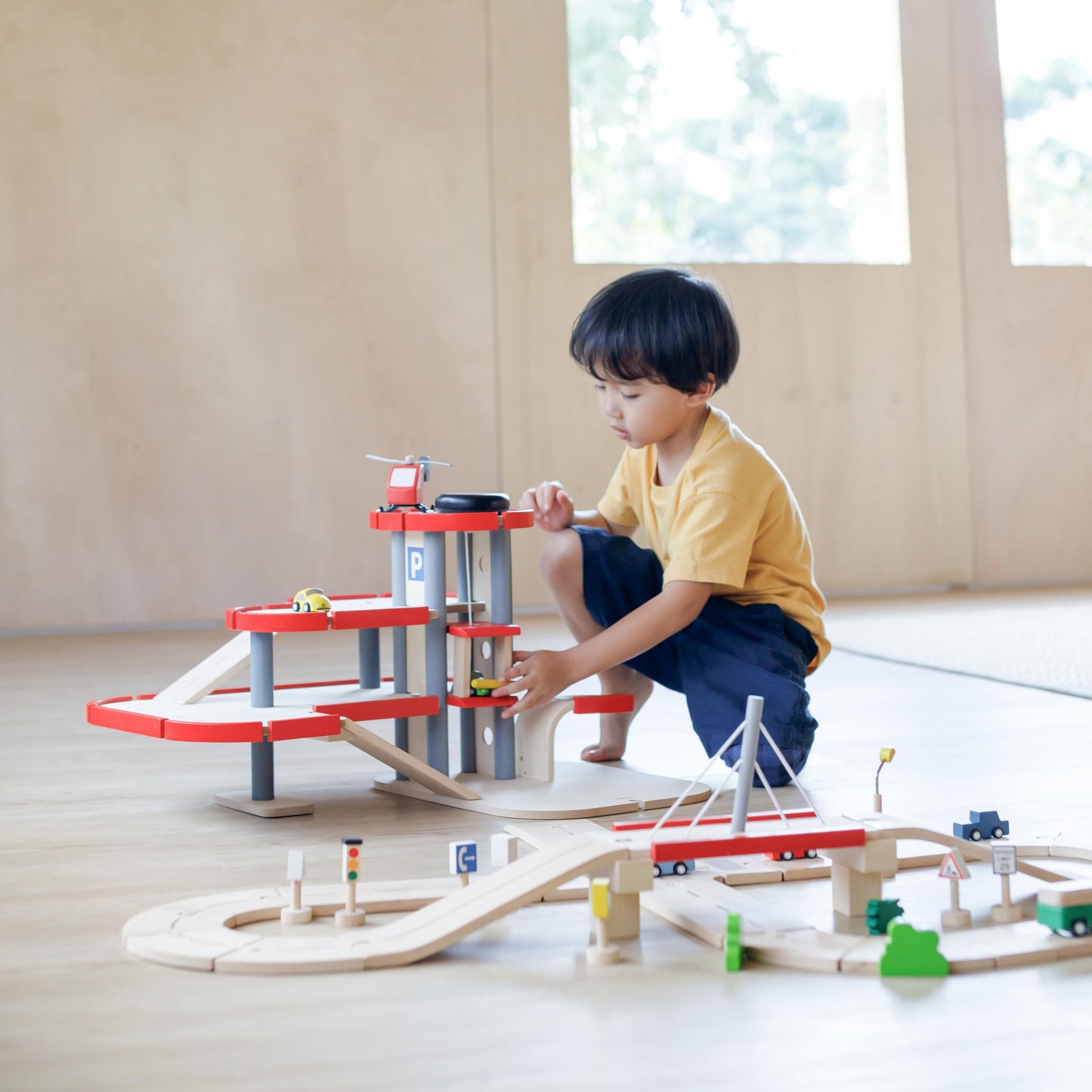 PlanToys® Parking Garage Wooden Montessori Imaginative and Creative Play Set | Problem Solving, Social Interaction and Early Coordination Activity | Eco Friendly Vehicle and Ramp Play Set