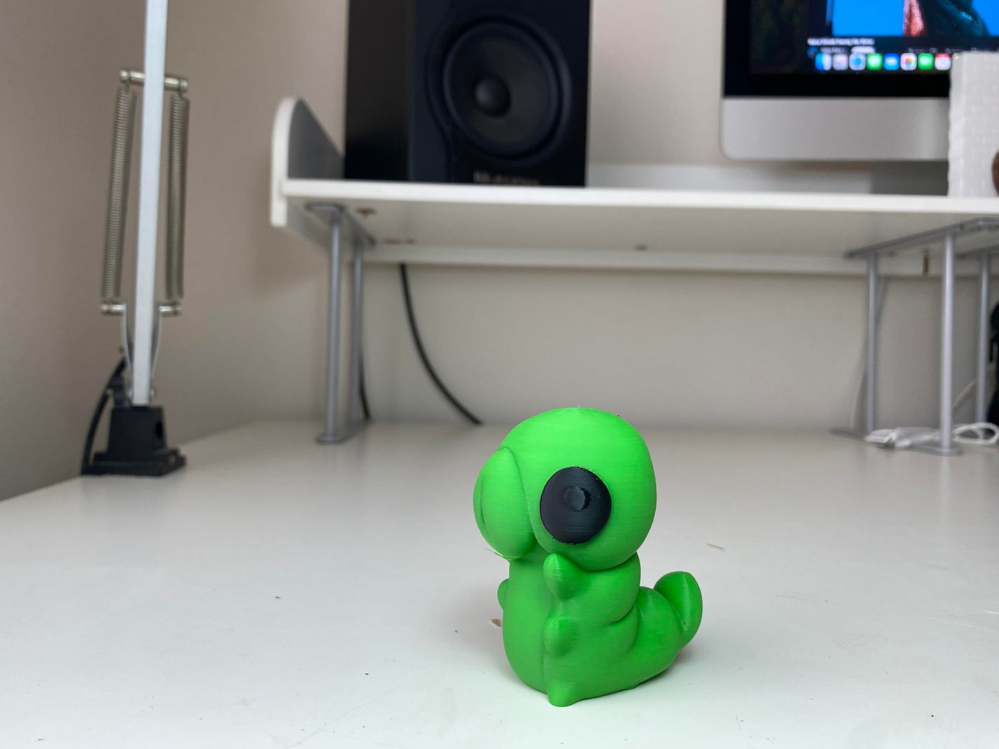 Little Green Grub Figurine - Vibrant Handheld Forest Creature Statue - Indie Game Inspired Desktop Companion and Gaming Room Shelf Decor