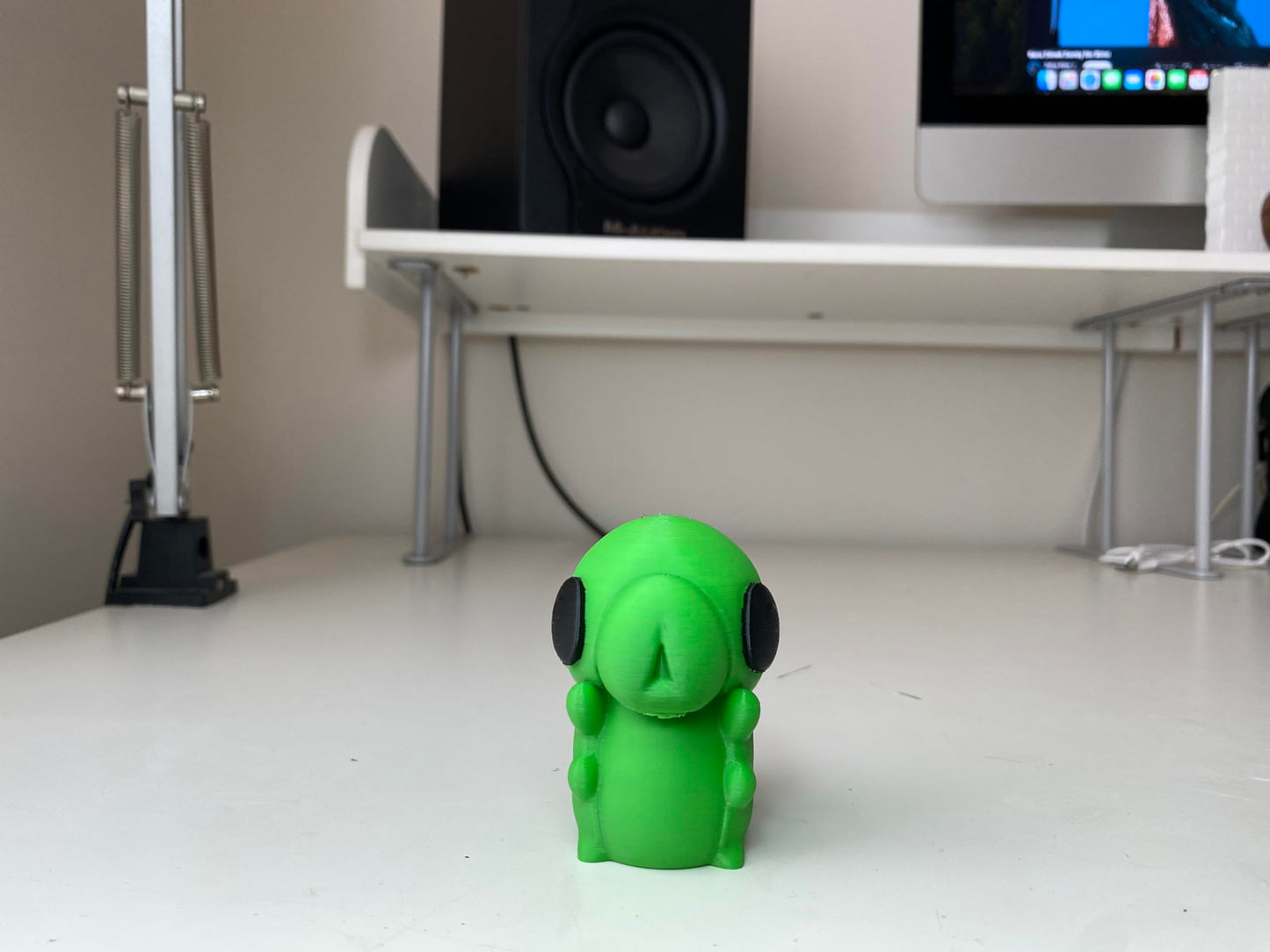 Little Green Grub Figurine - Vibrant Handheld Forest Creature Statue - Indie Game Inspired Desktop Companion and Gaming Room Shelf Decor