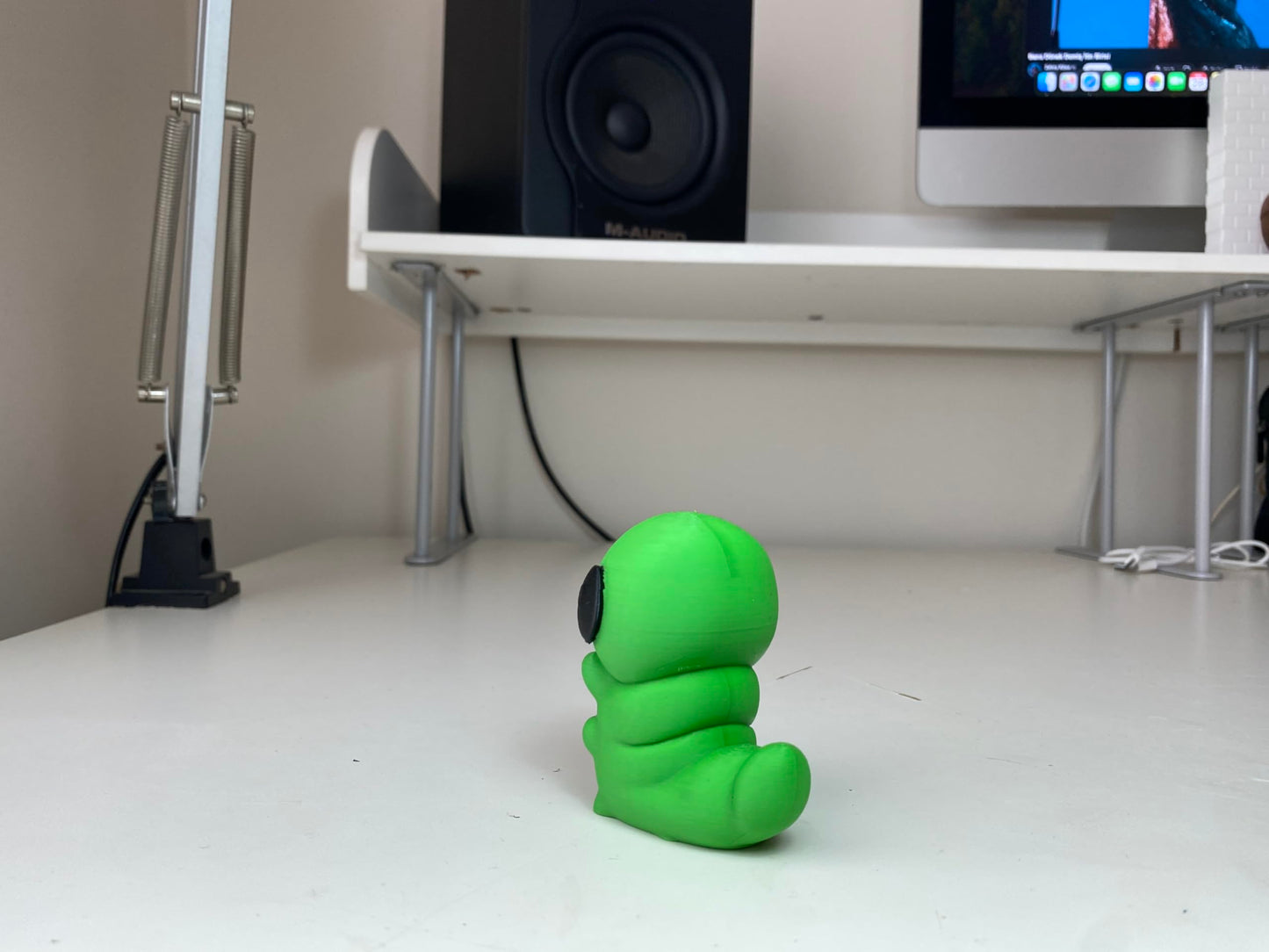 Little Green Grub Figurine - Vibrant Handheld Forest Creature Statue - Indie Game Inspired Desktop Companion and Gaming Room Shelf Decor